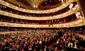 THE AUDIENCE TAKE THEIR SEATS AT OPENING OF ROYAL OPERA HOUSE