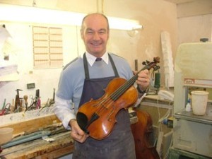 William Piper with one of his hand-made violins